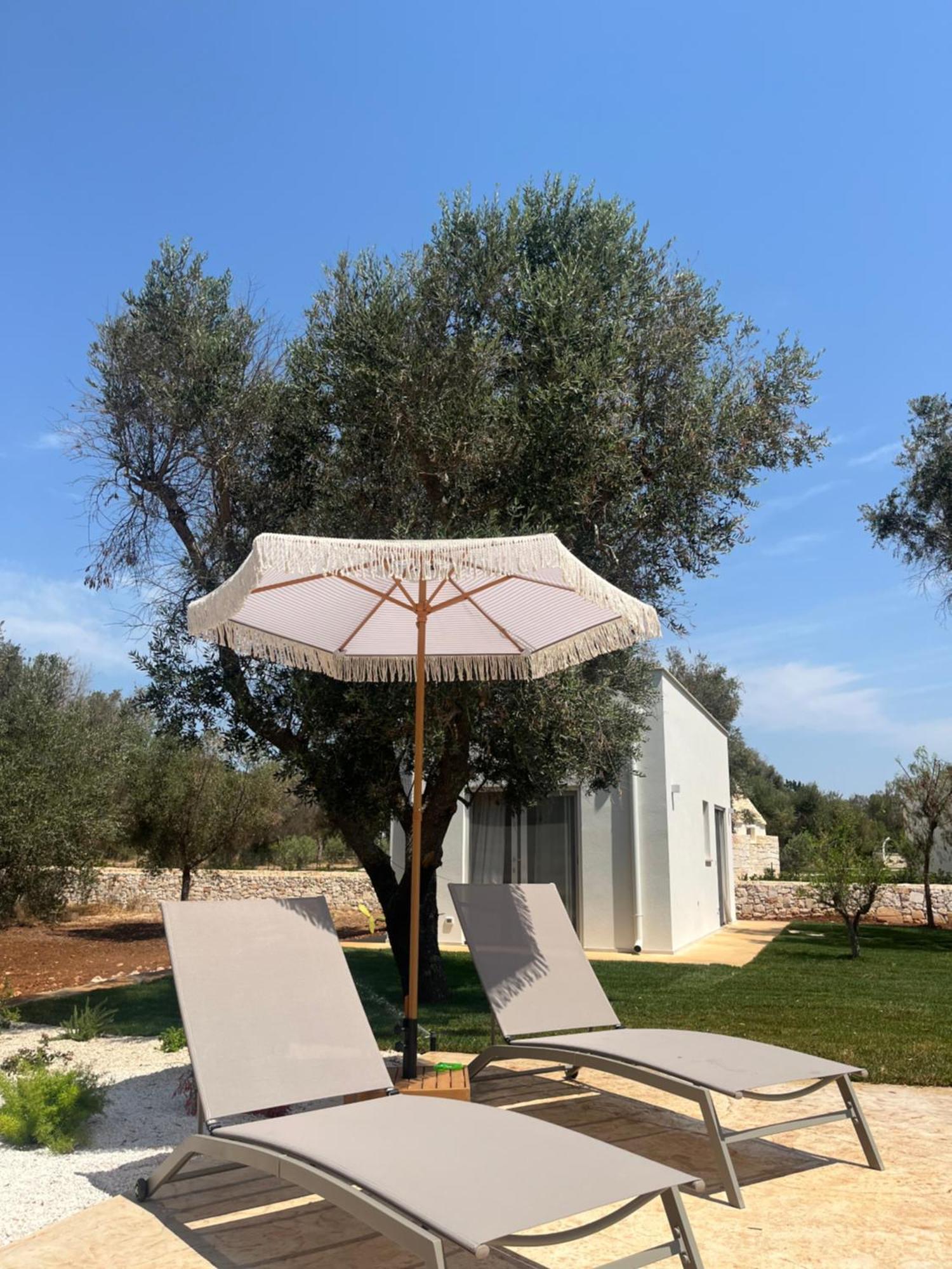 Trullo Gritti All'Antico Uliveto سان ميكيلي سالنتينو المظهر الخارجي الصورة